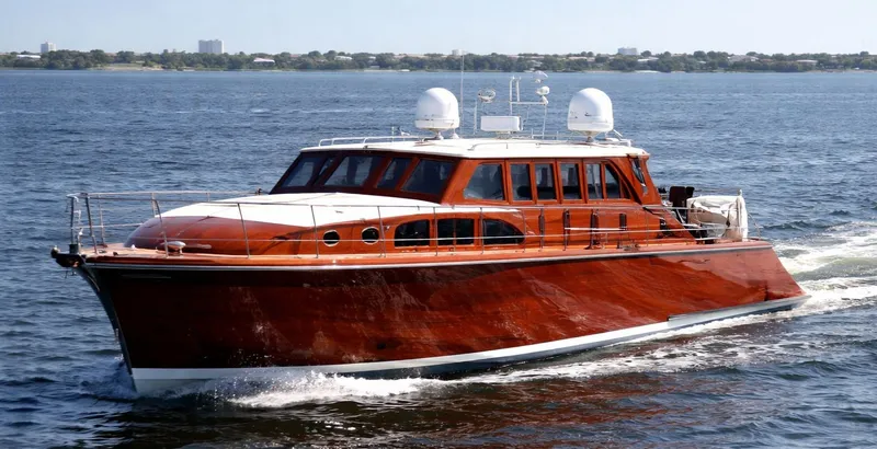 The Image of Luxurious wooden yacht on calm waters, featuring elegant windows and modern equipment. - 1