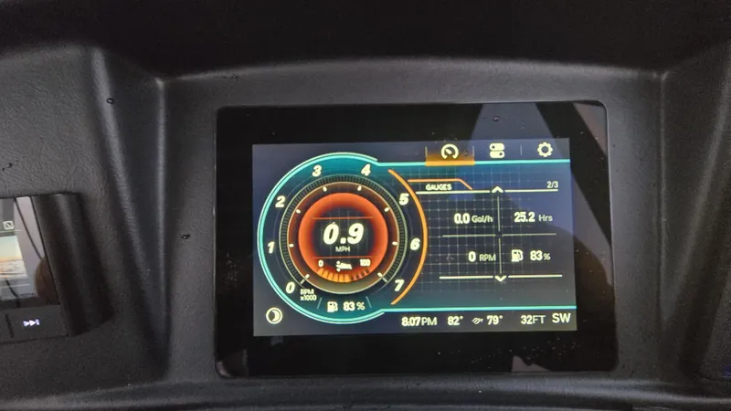 Slide: The Image of Digital dashboard displaying speed and fuel gauges. - 12