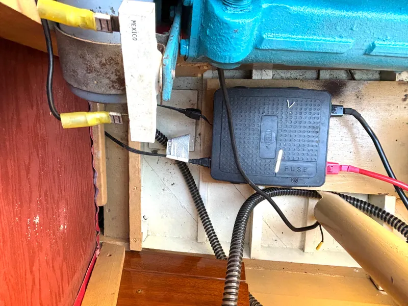 Slide: The Image of An engine compartment with wiring and fuse box in a 1956 Chris-Craft Capri. - 30