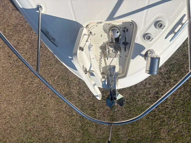 Slide: The Image of Bow view of a Sea Ray Sundancer 310 with anchor and chain mechanism. - 37