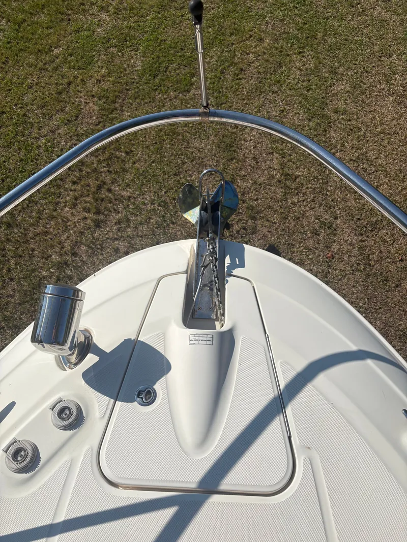 Slide: The Image of Bow of a Sea Ray Sundancer 310 with anchor and stainless steel railing. - 39