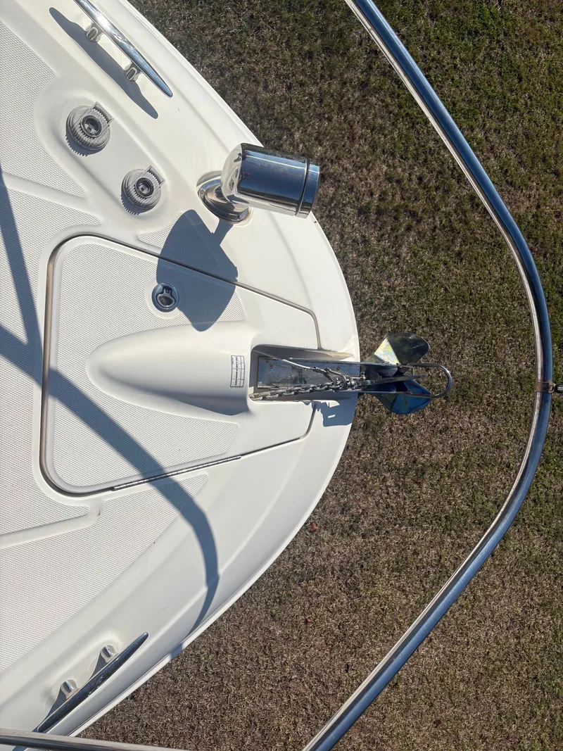 Slide: The Image of Bow view of the Sea Ray Sundancer 310 with anchor and stainless steel railing. - 38