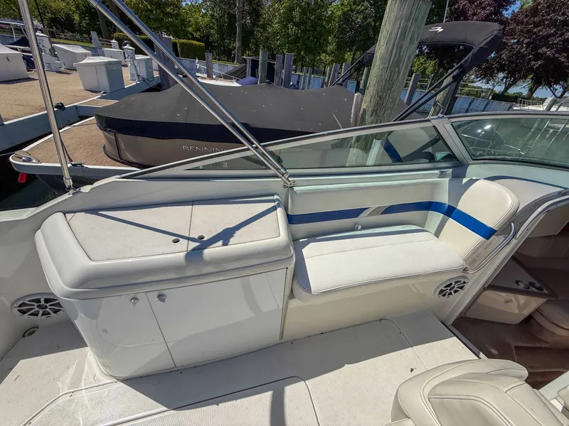 Slide: The Image of The image shows the cockpit of a 2001 Formula 280 Sun Sport with white seating and blue accents. - 9