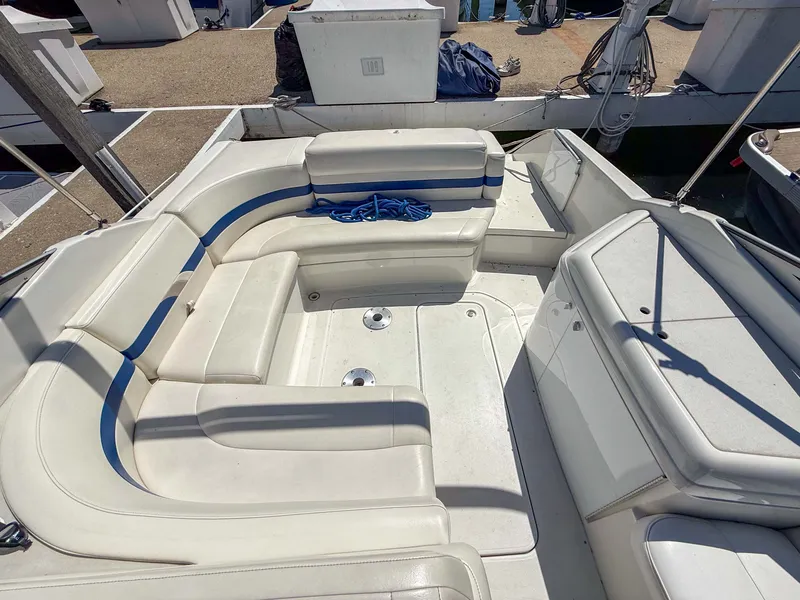 Slide: The Image of The image shows the cockpit of a 2001 Formula 280 Sun Sport with white and blue seating. - 8
