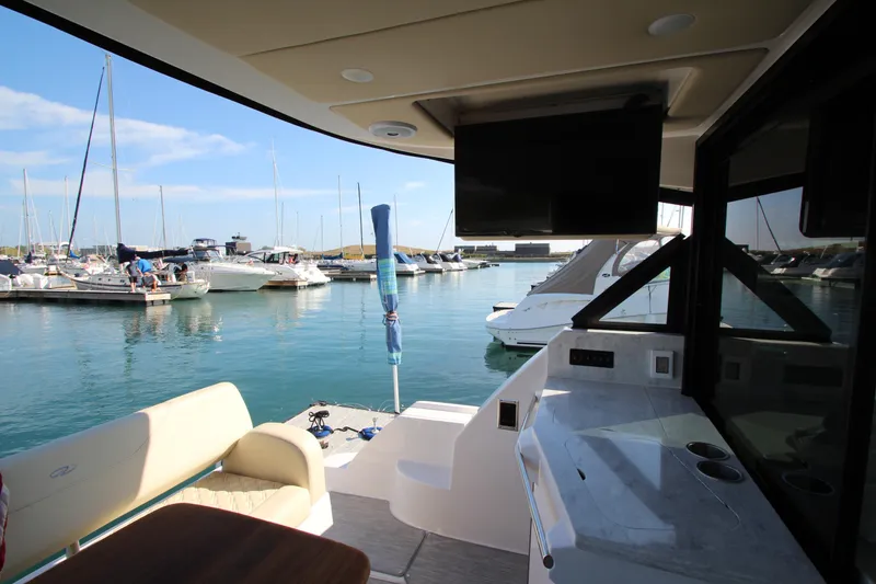 Slide: The Image of Blick von der Regal 38 Grande Coupe auf einen Yachthafen mit mehreren Booten im Wasser. - 34