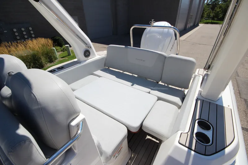 Slide: The Image of 2023 Zodiac Medline 7.5 boat interior with cushioned seating and modern design. - 11