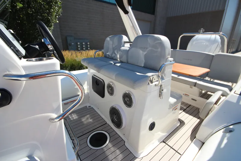 Slide: The Image of 2023 Zodiac Medline 7.5 boat interior with seating and control panel. - 19