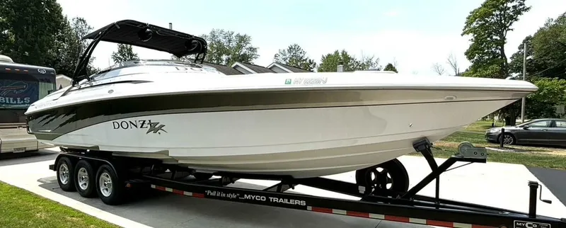 Slide: The Image of A 2005 Donzi 33 ZX on a trailer, ready for transport. - 7
