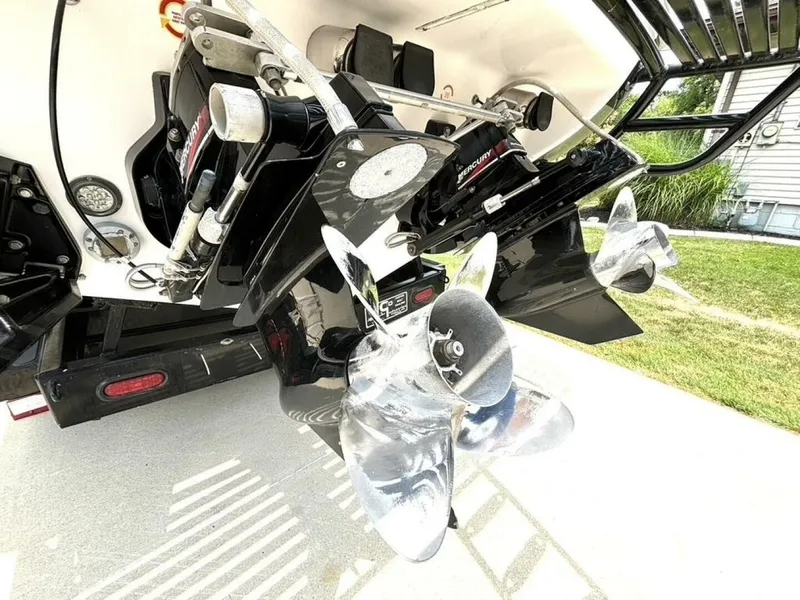Slide: The Image of Close-up of the drive and propellers of a 2005 Donzi 33 ZX, on a trailer. - 11
