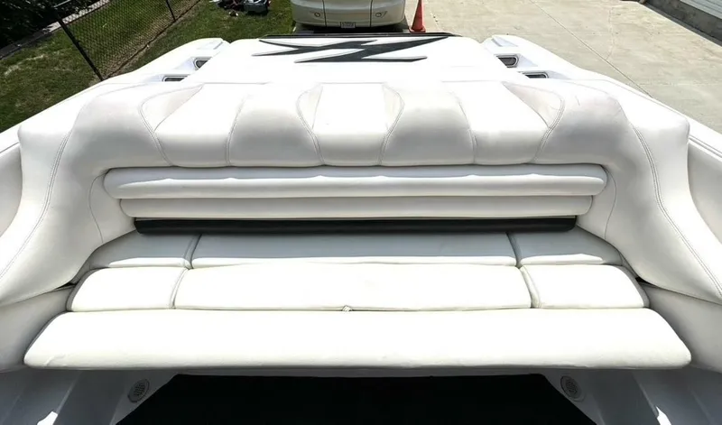 Slide: The Image of The image shows the white upholstery of a 2005 Donzi 33 ZX boat. - 17