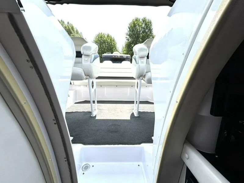 Slide: The Image of View from inside a Donzi 33 ZX boat, looking out to the cockpit and outdoor seating. - 38