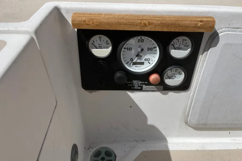 Slide: The Image of Instrument panel of a 1980 Cape Dory 30 sailboat with gauges and controls. - 10