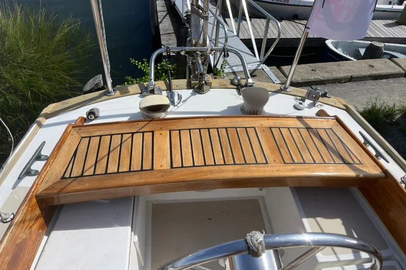 Slide: The Image of Cockpit of 1980 Cape Dory 30 sailboat with wooden tiller and stainless steel fittings. - 8