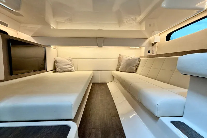 Slide: The Image of Luxurious interior of 2022 Regal 36 XO yacht with plush seating and modern design. - 39