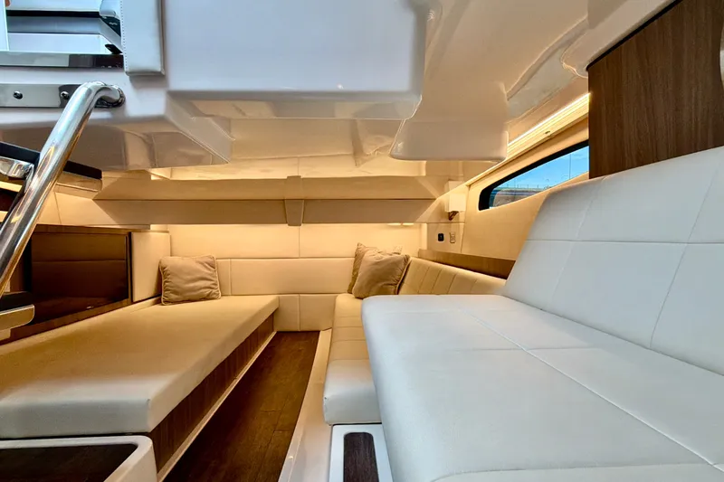 Slide: The Image of Luxurious interior of 2022 Regal 36 XO yacht with plush seating and modern design. - 38