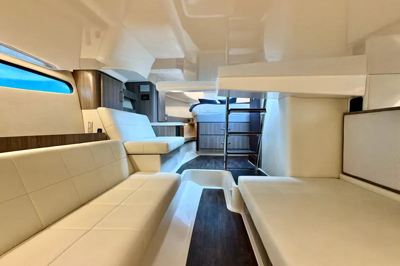 Slide: The Image of Luxurious interior of 2022 Regal 36 XO yacht with modern seating and elegant design. - 40
