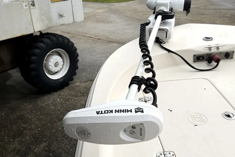 Slide: The Image of 2022 Carolina Skiff 178 CC with Minn Kota trolling motor on deck. - 9