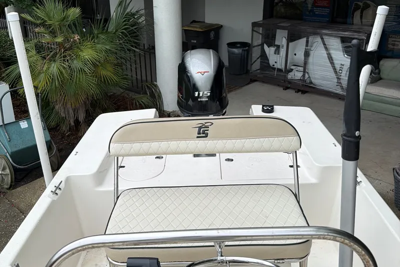 Slide: The Image of 2022 Carolina Skiff 178 CC boat with Yamaha 115 engine, outdoor setting. - 7