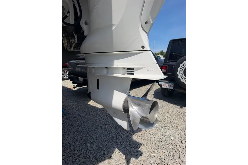 Slide: The Image of 2019 Regulator 41 boat engine propeller on gravel surface. - 23