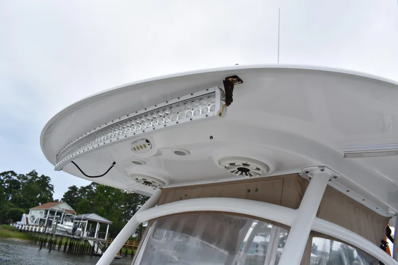 Slide: The Image of 2017 Sportsman Open 312 Center Console boat with LED lights and speaker system. - 8