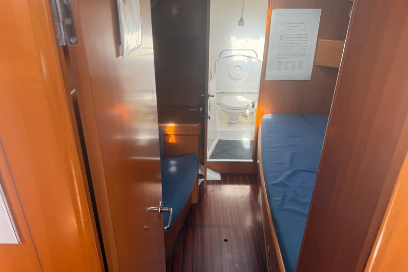 Slide: The Image of Interior of 2006 Beneteau First 44.7 yacht showing cabin and bathroom. - 33