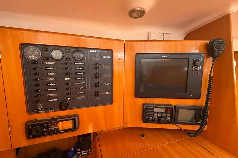 Slide: The Image of Control panel of a 2006 Beneteau First 44.7 yacht with navigation equipment. - 32