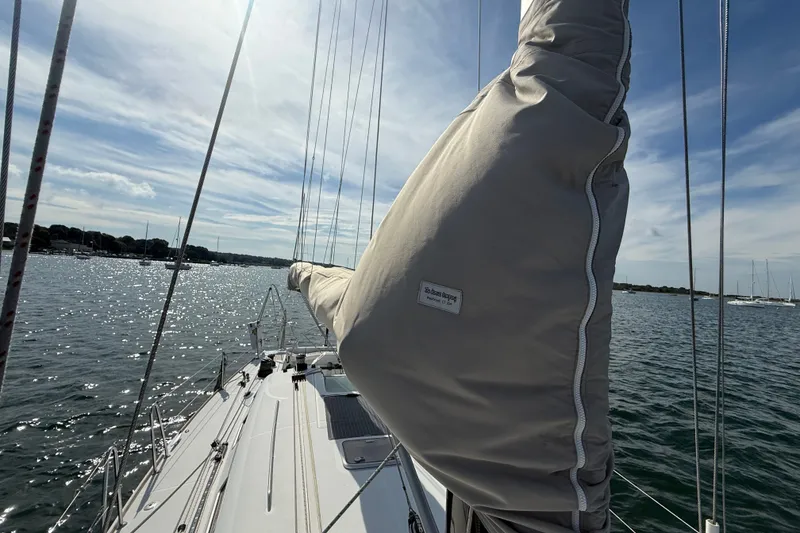 Slide: The Image of Sailing on a 2006 Beneteau First 44.7 yacht, calm waters, sunny day. - 13