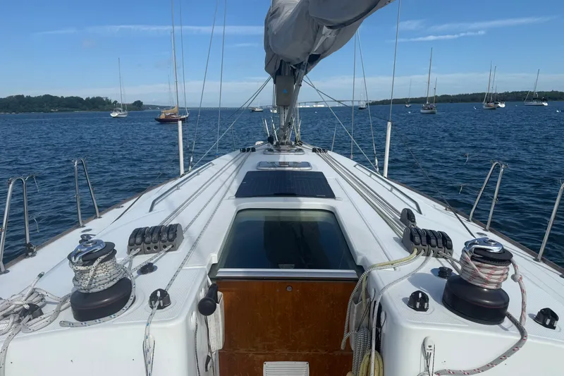 Slide: The Image of Sailing deck of 2006 Beneteau First 44.7 yacht on calm waters. - 8