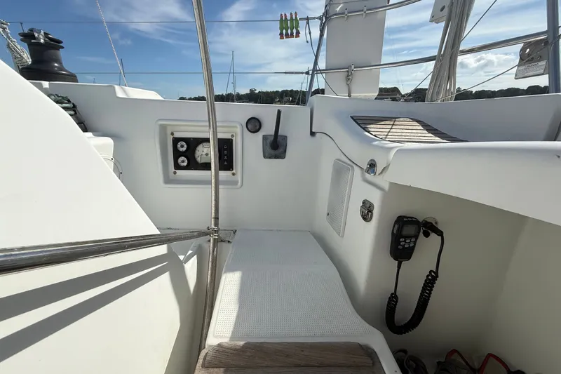 Slide: The Image of Cockpit of 2006 Beneteau First 44.7 sailboat with navigation instruments and clear sky. - 18