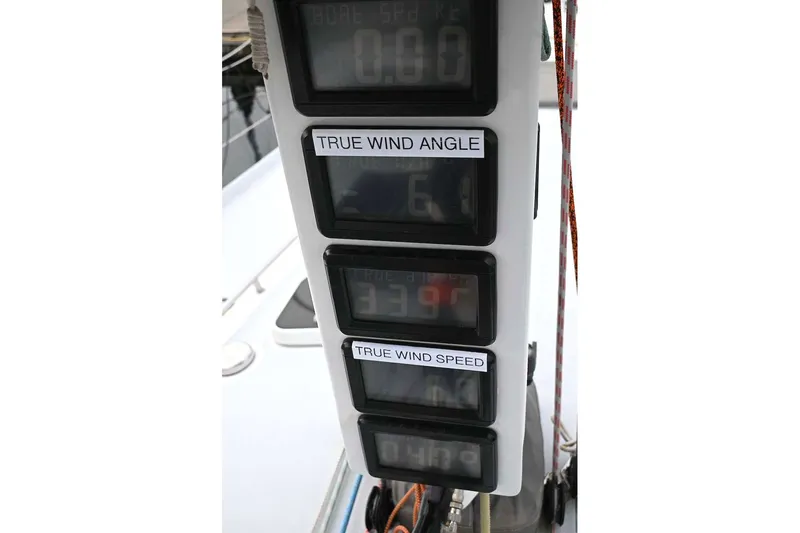 Slide: The Image of Digital wind instruments on a 1992 Santa Cruz 52 sailboat, displaying true wind angle and speed. - 33