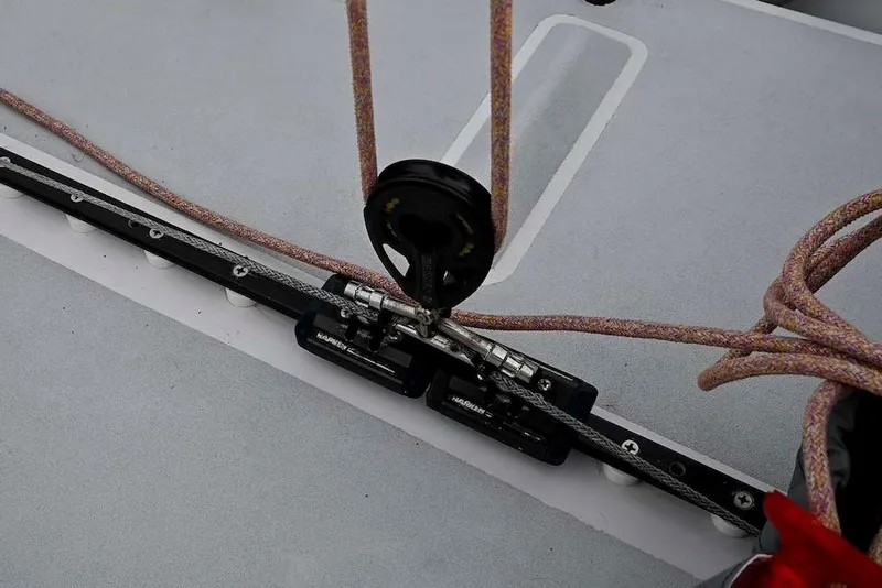 Slide: The Image of Close-up of sailing rigging on a 1992 Santa Cruz 52 yacht deck. - 49