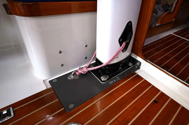 Slide: The Image of Interior view of a 1992 Santa Cruz 52 sailboat mast base with wooden flooring. - 30