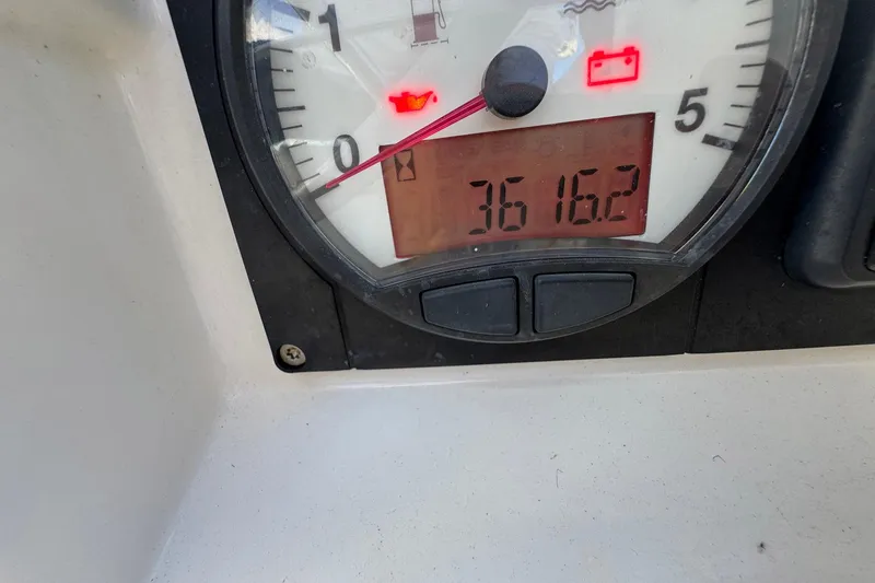 Slide: The Image of Close-up of Jeanneau Sun Odyssey 389 gauge displaying 3616.2 hours, 2018 model. - 58