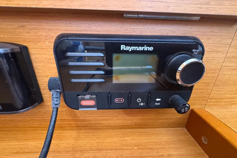 Slide: The Image of Raymarine marine radio on 2018 Jeanneau Sun Odyssey 389 yacht dashboard. - 56