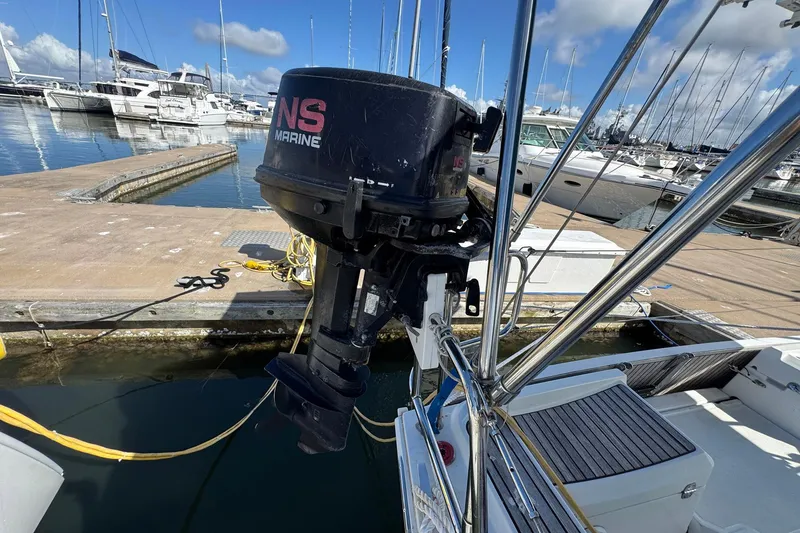 Slide: The Image of Outboard motor on Jeanneau Sun Odyssey 389, 2018 model, docked at marina. - 61