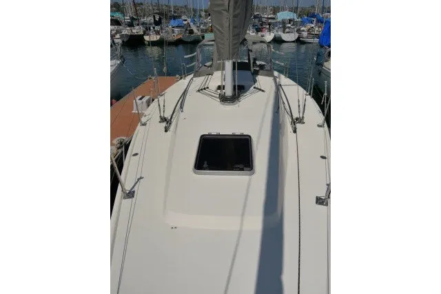 Slide: The Image of 2004 J Boats J/109 sailboat deck view in marina setting. - 55