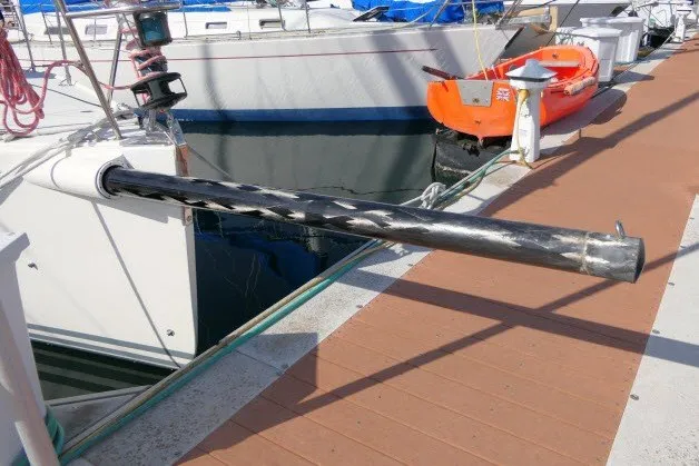 Slide: The Image of 2004 J Boats J/109 sailboat docked with visible carbon fiber bowsprit. - 59
