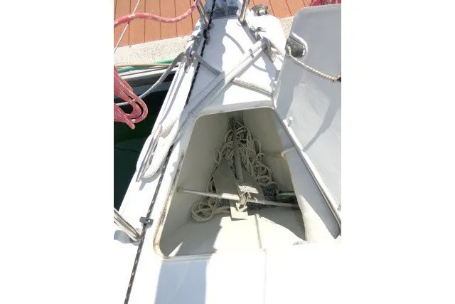 Slide: The Image of Bow of 2004 J Boats J/109 sailboat with anchor and ropes visible. - 57