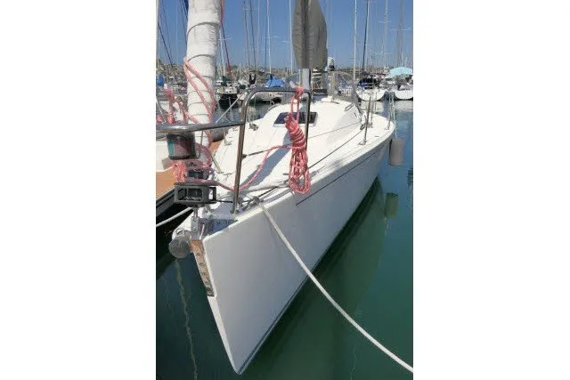 Slide: The Image of 2004 J Boats J/109 sailboat docked in marina, front view. - 70