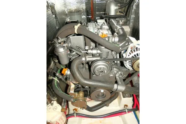 Slide: The Image of Engine of a 2004 J Boats J/109 sailboat, showcasing mechanical components. - 64