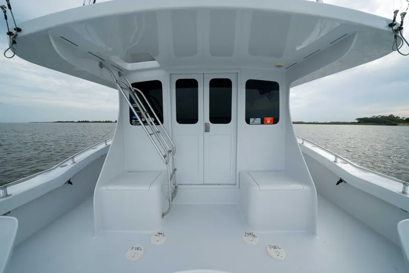 Slide: The Image of Bateau Custom Carolina 57 Buddy Cannady sur l'eau, année 1990. - 30