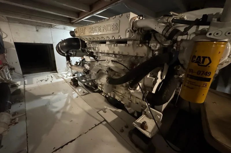 Slide: The Image of Engine room of 1990 Buddy Cannady 57 Custom Carolina with CAT Marine Power engine. - 11
