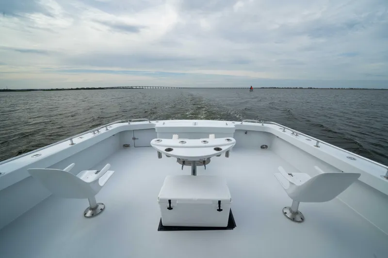 Slide: The Image of Bateau Custom Carolina 57 Buddy Cannady sur l'eau, modèle 1990. - 27
