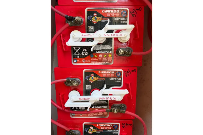 Slide: The Image of Red deep cycle batteries in a 2005 Duffy Classic 21 boat. - 19