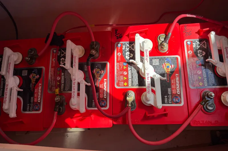 Slide: The Image of Red deep cycle batteries in a 2005 Duffy Classic 21 boat. - 21