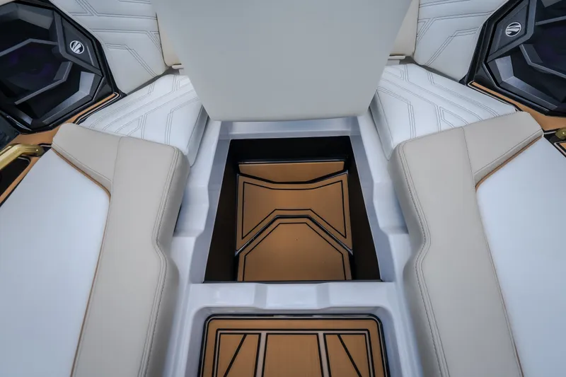 Slide: The Image of Interior view of 2027 Tigé Ultré 23ZX boat with stylish seating and storage. - 75
