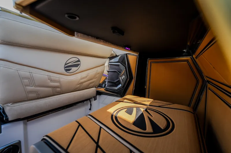 Slide: The Image of Luxurious interior of 2027 Tigé Ultré 23ZX boat with stylish seating and modern design. - 45