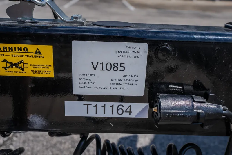 Slide: The Image of Label on Tigé Ultré 23ZX trailer hitch, showing serial and shipping details. - 67