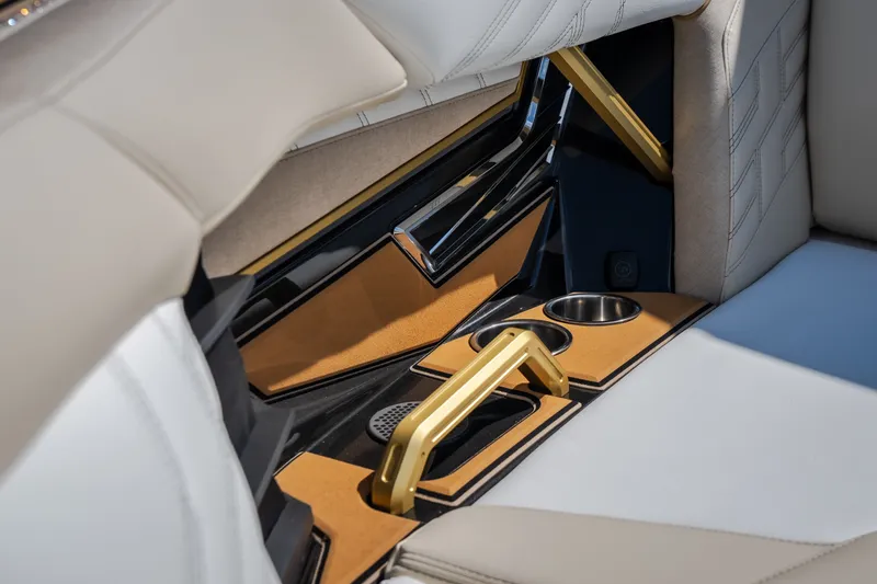 Slide: The Image of Luxurious interior of 2027 Tigé Ultré 23ZX boat with elegant seating and cup holders. - 72