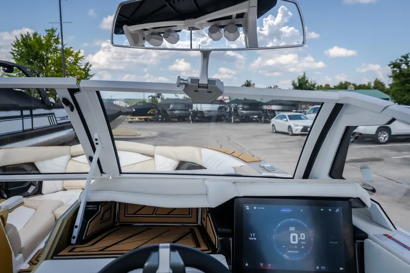Slide: The Image of Interior view of 2027 Tigé Ultré 23ZX boat with modern dashboard and touchscreen display. - 41
